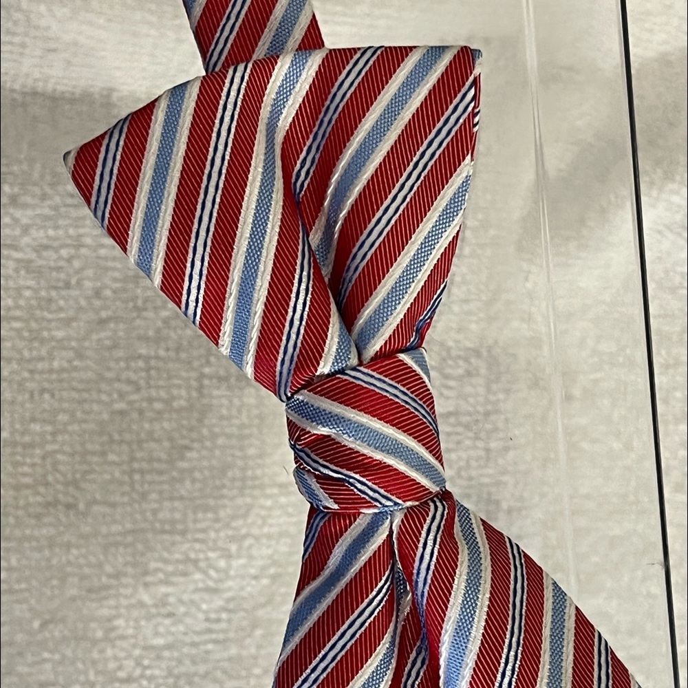 New condition Saddlebred pre-tied adjustable length striped bow tie.